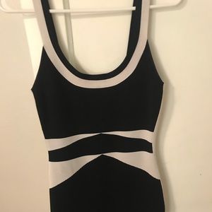 Black/white Marciano dress. Form fitting